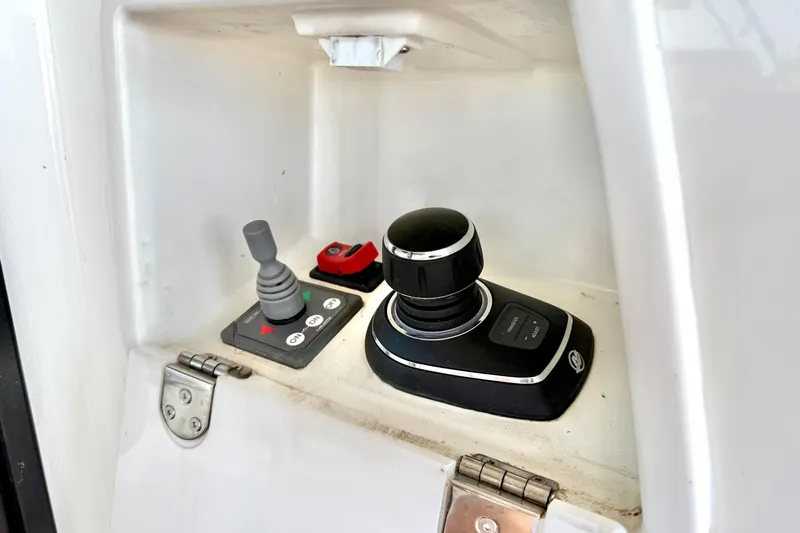 Freiheit Yacht Photos Pics Control panel of a 2020 Prestige 590 yacht, featuring joystick and switches.