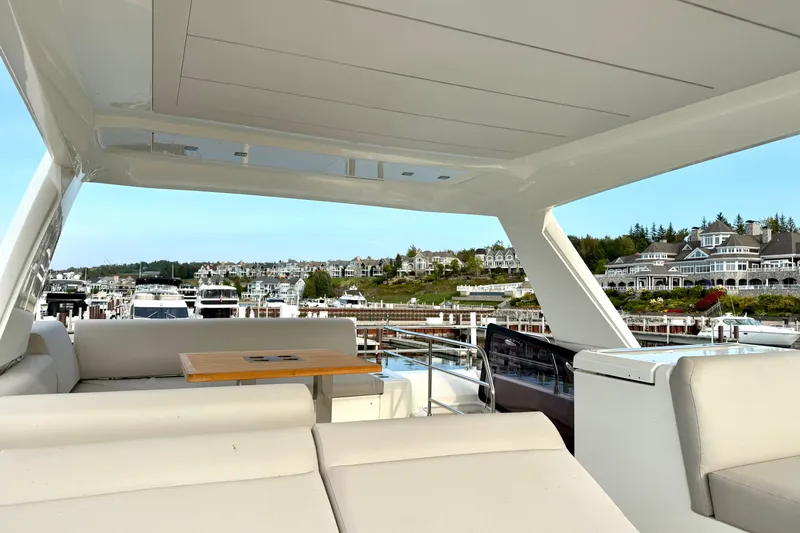 Freiheit Yacht Photos Pics Luxurious 2020 Prestige 590 yacht interior with scenic marina view.