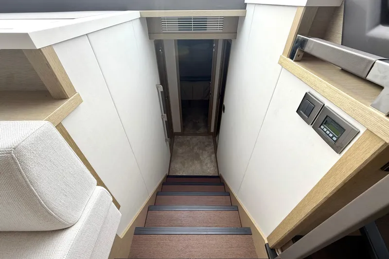 Freiheit Yacht Photos Pics Staircase in 2020 Prestige 590 yacht interior with modern design and control panel.