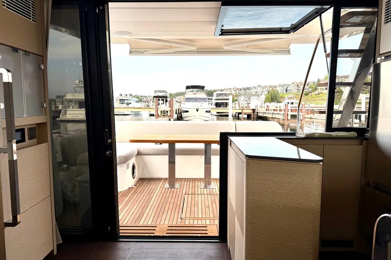 Freiheit Yacht Photos Pics Interior view of a 2020 Prestige 590 yacht, showcasing a sleek, modern design.