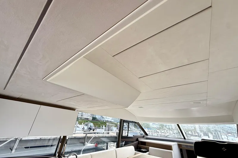 Freiheit Yacht Photos Pics Interior view of 2020 Prestige 590 yacht with modern ceiling design.