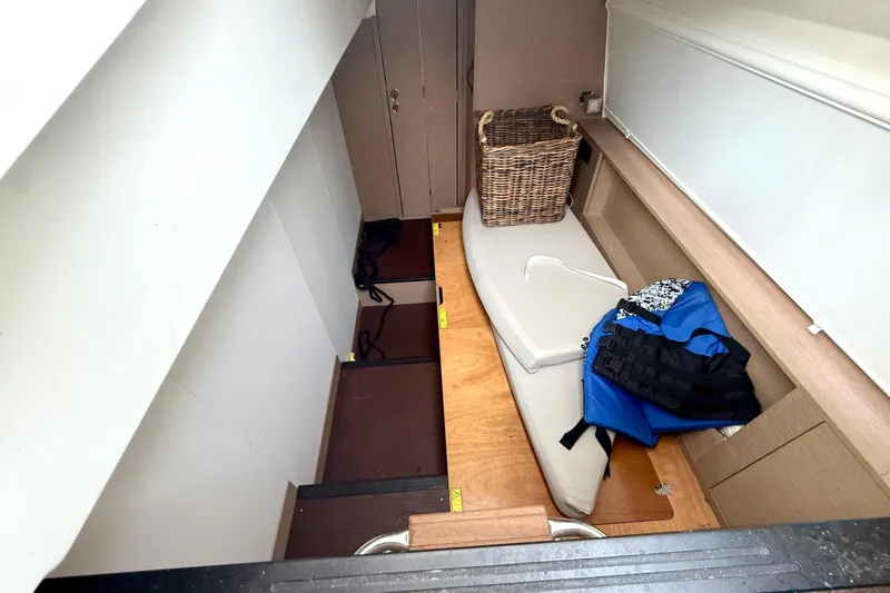 Freiheit Yacht Photos Pics Interior of 2020 Prestige 590 yacht with storage area and life jackets.