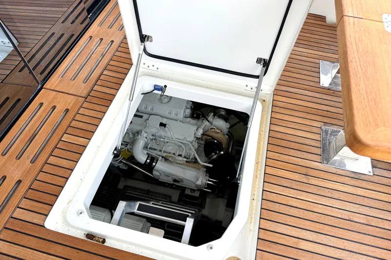 Freiheit Yacht Photos Pics Engine compartment of 2020 Prestige 590 yacht with wooden deck detailing.