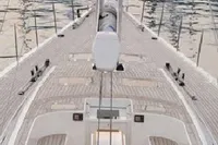 Sailing yacht Felci 71, 2006 model, docked in a marina with visible deck and controls.