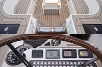 Luxurious 2006 Custom Felci 71 yacht interior with sleek cockpit and advanced navigation controls.