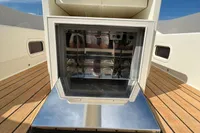 Custom Felci 71 yacht deck with open hatch, 2006 model, showcasing sleek design.