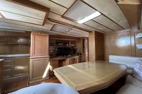Luxurious interior of 2006 Custom Felci 71 yacht with wooden furnishings and modern amenities.