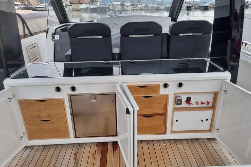  Yacht Photos Pics 2019 Fjord 44 Open yacht interior with sleek cabinetry and modern seating.