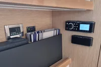 Control panel and audio system inside 2019 Fjord 44 Open yacht cabin.