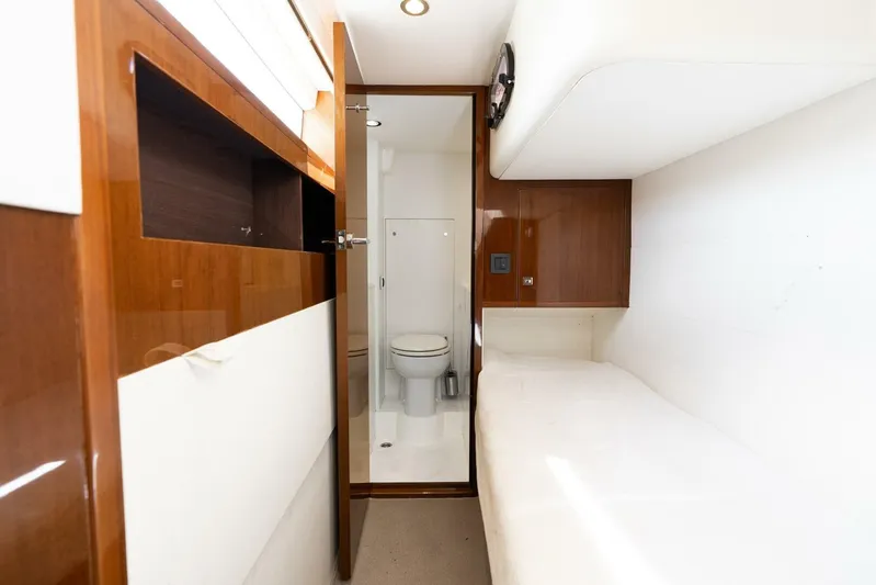 Sea Bandit Yacht Photos Pics Luxurious cabin interior of 2015 Princess 56 Flybridge Motor Yacht with ensuite bathroom.