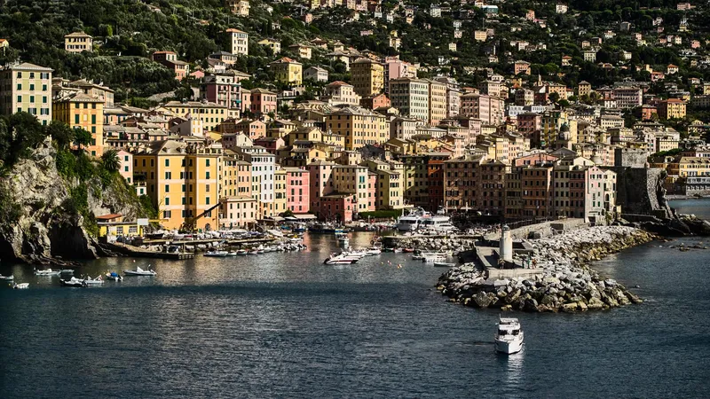  Yacht Photos Pics Colorful coastal town with boats in harbor, Northman 1300 model, 2025.