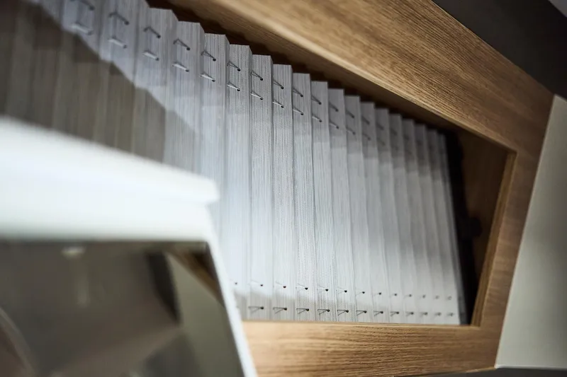  Yacht Photos Pics Pleated window blind in a Northman 1300, 2025 model, with wooden frame detail.