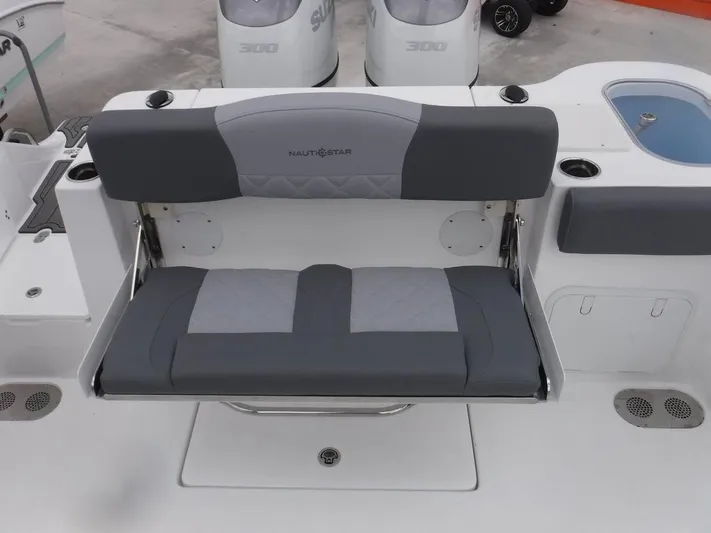  Yacht Photos Pics 2025 NauticStar 292 Legacy boat with gray cushioned seating and dual outboard motors.