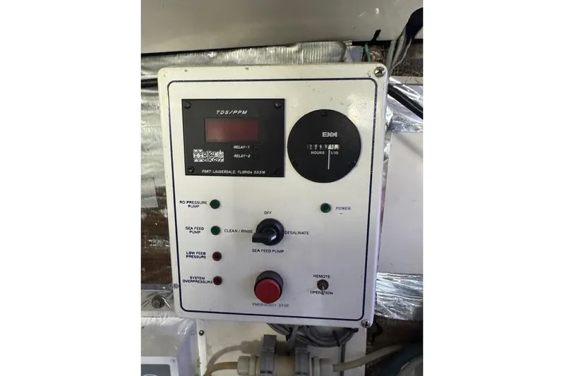 Foam O Yacht Photos Pics Control panel on a 2000 Cabo 45 Express boat, featuring various operational buttons and indicators.