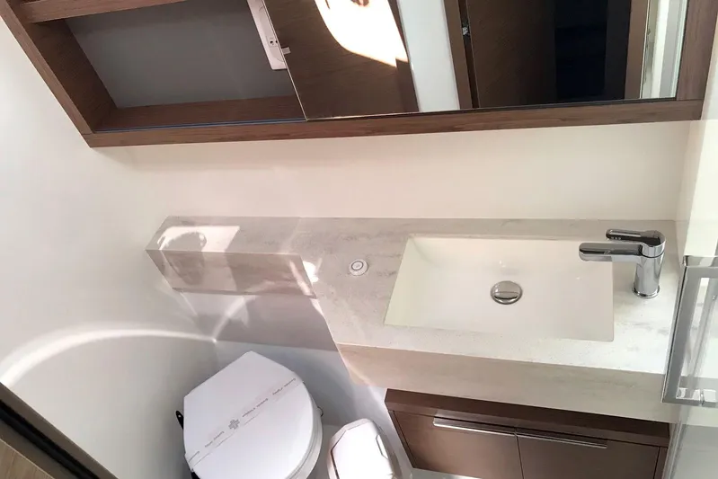  Yacht Photos Pics Modern bathroom in 2019 Lagoon 50 yacht with sleek sink and toilet.