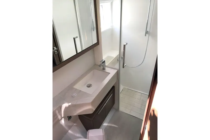  Yacht Photos Pics Modern bathroom in 2019 Lagoon 50 yacht with sleek sink and shower.