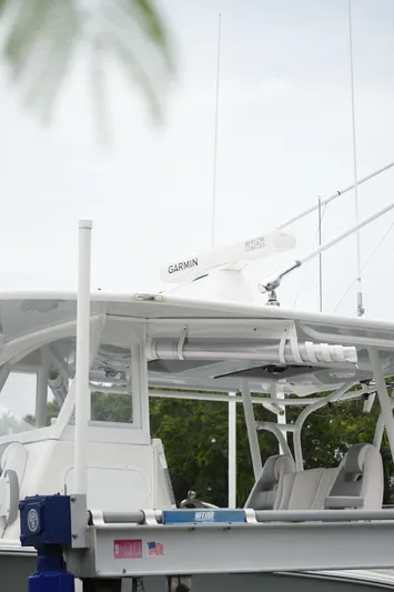  Yacht Photos Pics 2020 Tideline 365 boat with Garmin radar, docked, featuring comfortable seating and modern design.