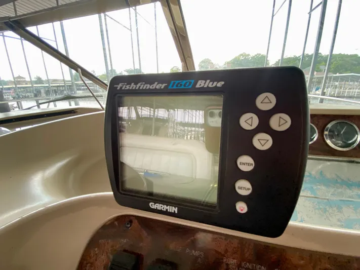  Yacht Photos Pics Garmin Fishfinder 160 Blue on 1999 Sea Ray 400 Sundancer boat dashboard.