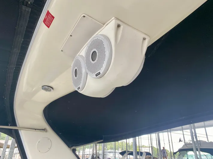  Yacht Photos Pics Speakers on a 1999 Sea Ray 400 Sundancer boat, under a black canopy.