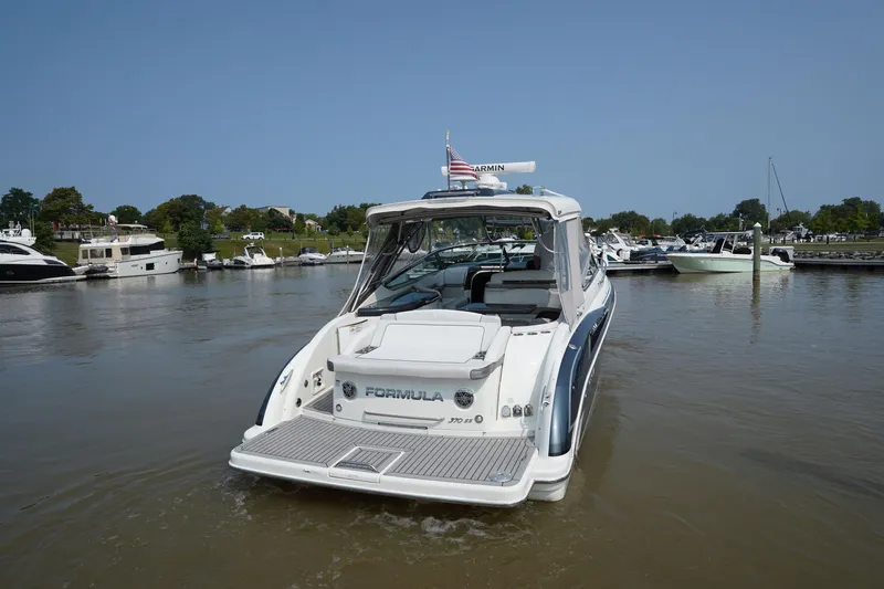 Have A Nice Life Yacht Photos Pics 2017 Formula 370 Super Sport boat docked in a marina, rear view.