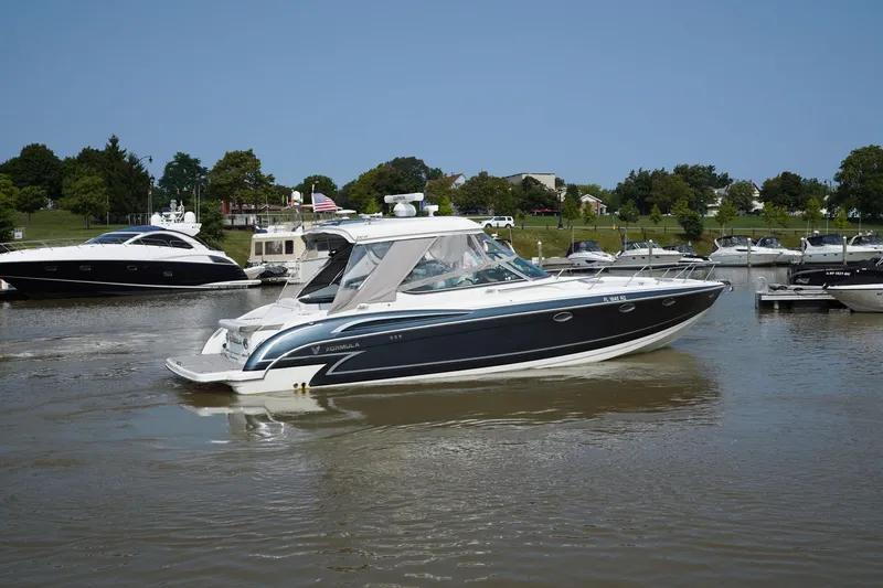 Have A Nice Life Yacht Photos Pics 2017 Formula 370 Super Sport boat docked in a marina, surrounded by other vessels.