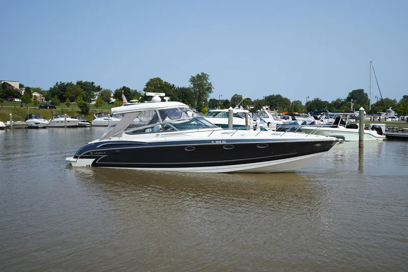 Have A Nice Life Yacht Photos Pics 2017 Formula 370 Super Sport boat docked in a marina, surrounded by other vessels.