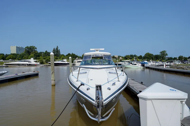 Have A Nice Life Yacht Photos Pics 2017 Formula 370 Super Sport boat docked in a marina under clear blue sky.