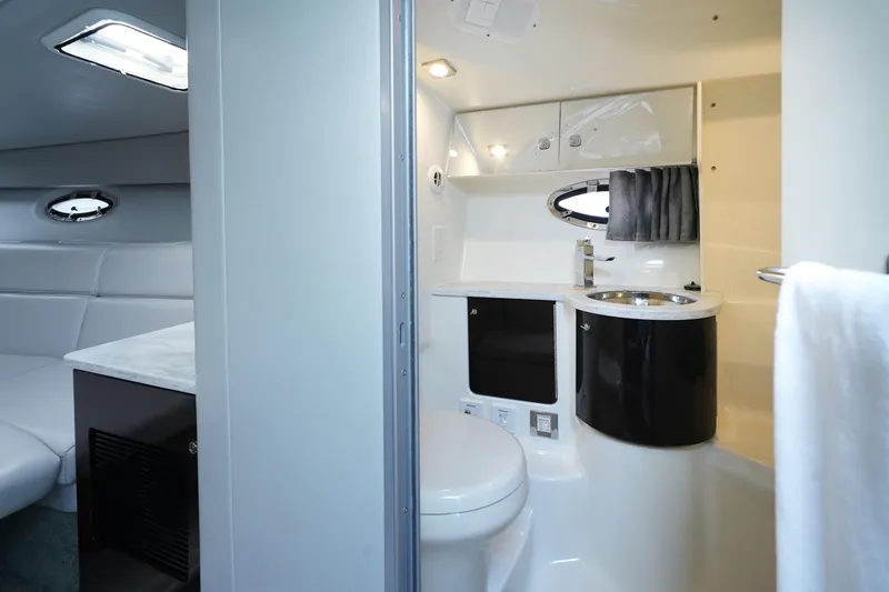 Have A Nice Life Yacht Photos Pics 2017 Formula 370 Super Sport yacht interior with modern bathroom and seating area.