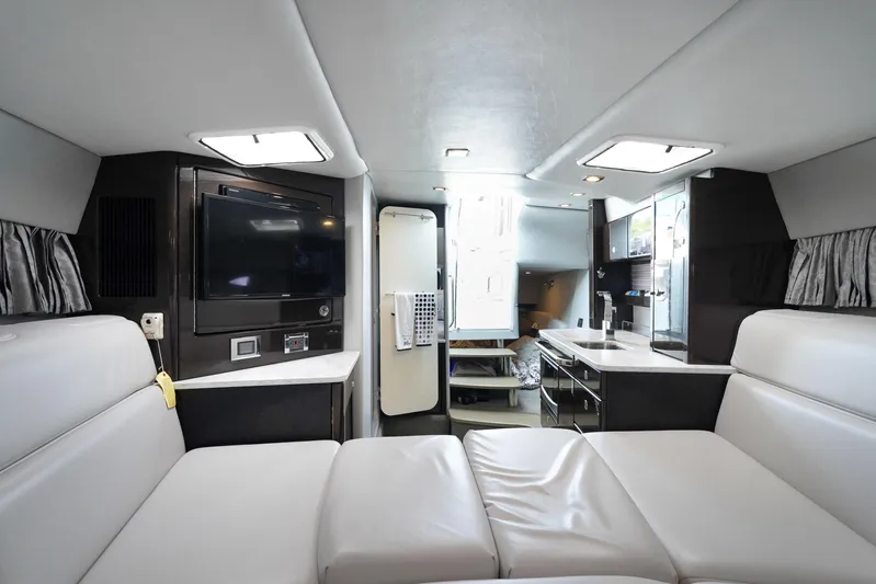 Have A Nice Life Yacht Photos Pics Interior of 2017 Formula 370 Super Sport yacht with modern seating and entertainment area.