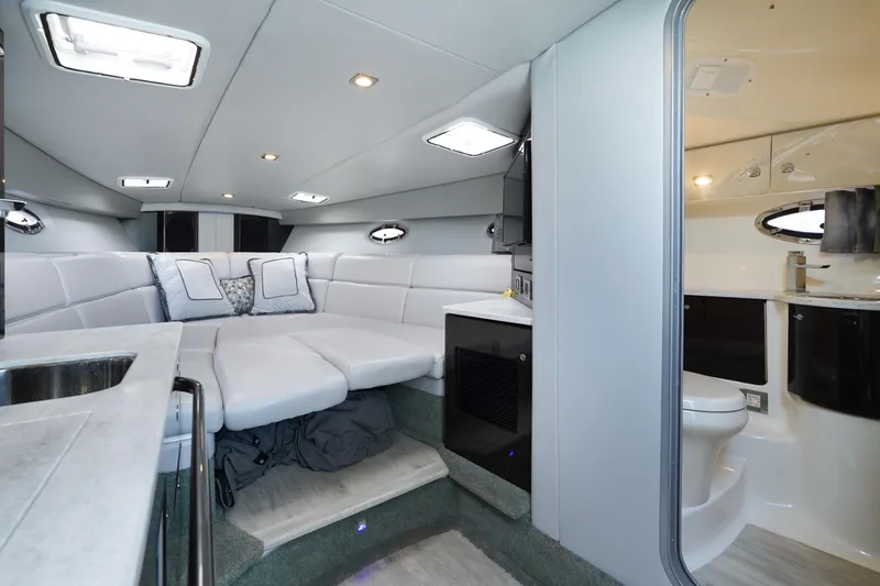 Have A Nice Life Yacht Photos Pics Interior of 2017 Formula 370 Super Sport boat with modern seating and compact bathroom.