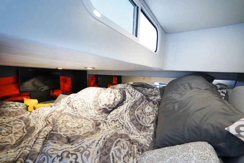 Have A Nice Life Yacht Photos Pics Interior cabin of 2017 Formula 370 Super Sport with cozy bedding and window view.
