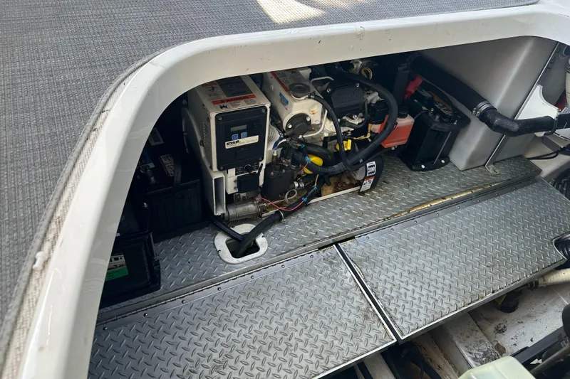 Have A Nice Life Yacht Photos Pics Engine compartment of a 2017 Formula 370 Super Sport boat, showcasing mechanical components.