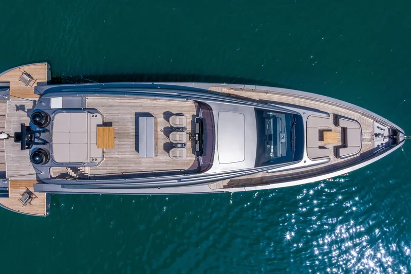 Ciao Yacht Photos Pics Aerial view of 2025 Pershing GTX 80 yacht on sparkling blue water.