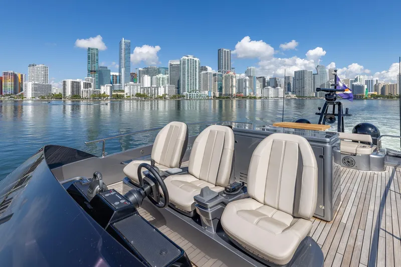 Ciao Yacht Photos Pics Luxury Pershing GTX 80 yacht with city skyline backdrop, 2025 model.
