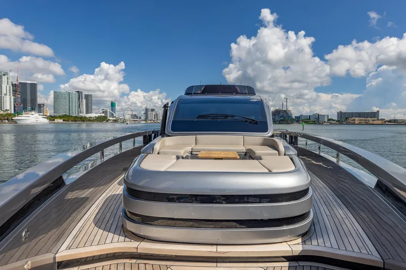 Ciao Yacht Photos Pics Luxury Pershing GTX 80 yacht, 2025 model, docked with city skyline in background.