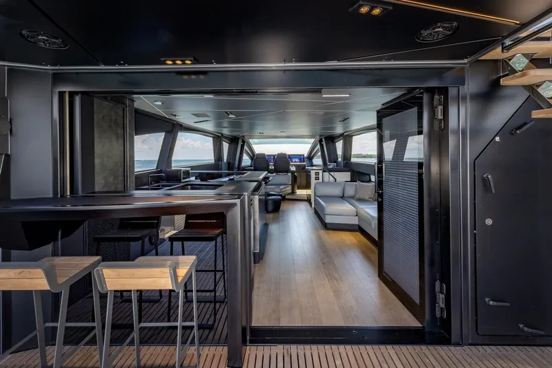 Ciao Yacht Photos Pics Luxurious interior of 2025 Pershing GTX 80 yacht with modern seating and sleek design.