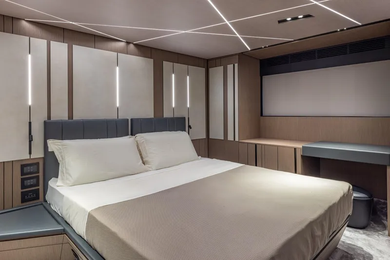Ciao Yacht Photos Pics Luxurious bedroom interior of 2025 Pershing GTX 80 yacht with modern design and ambient lighting.