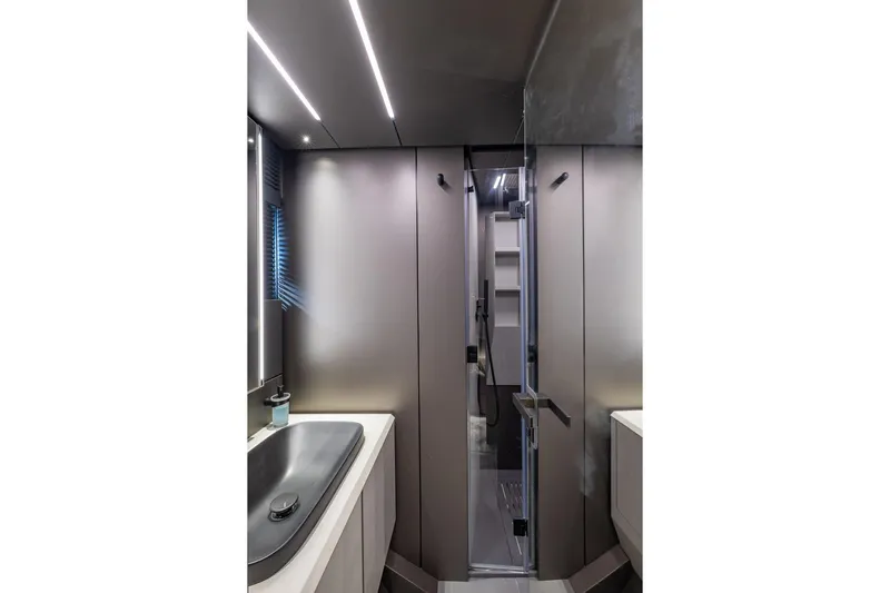 Ciao Yacht Photos Pics Modern bathroom interior of 2025 Pershing GTX 80 yacht with sleek design and lighting.