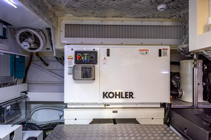 Ciao Yacht Photos Pics Engine room of 2025 Pershing GTX 80 yacht featuring Kohler generator.