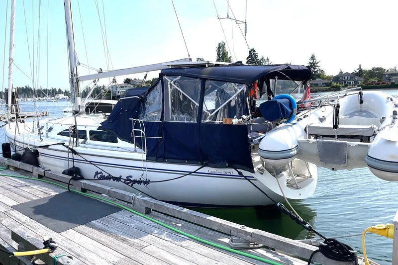 Kindred Spirit Yacht Photos Pics 2005 Catalina 36 MkII sailboat docked with inflatable dinghy attached.