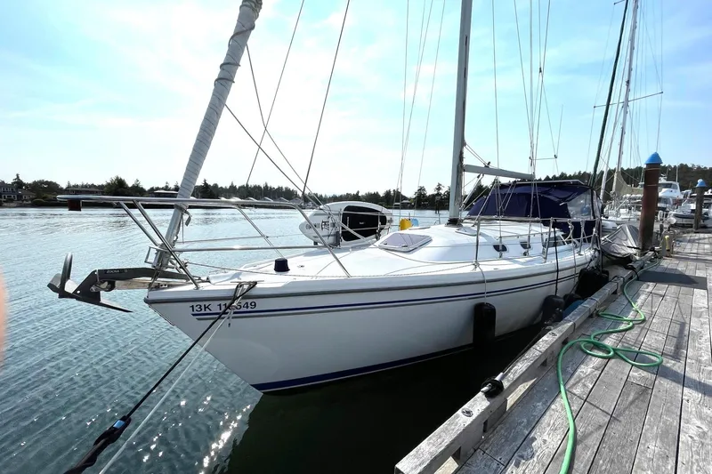 Kindred Spirit Yacht Photos Pics 2005 Catalina 36 MkII sailboat docked at a marina, sunny day, calm waters.