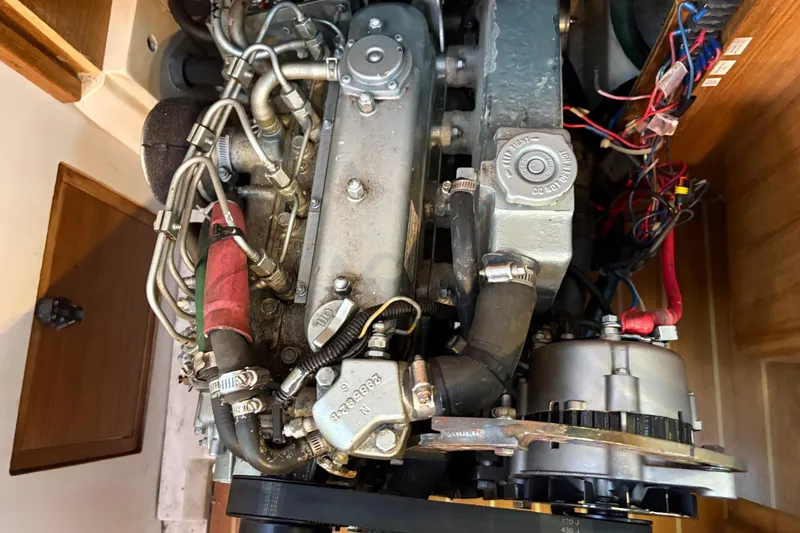 Kindred Spirit Yacht Photos Pics Engine of a 2005 Catalina 36 MkII sailboat, showcasing intricate mechanical components.