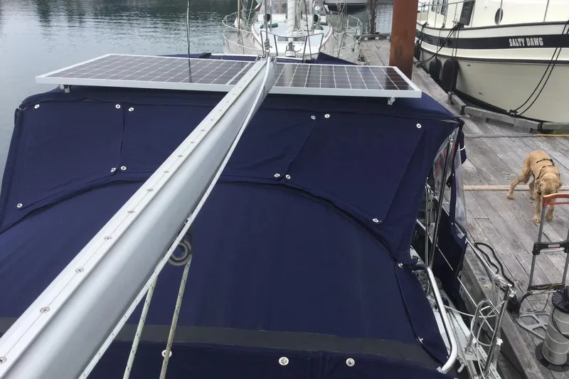 Kindred Spirit Yacht Photos Pics 2005 Catalina 36 MkII sailboat with solar panels docked at marina.