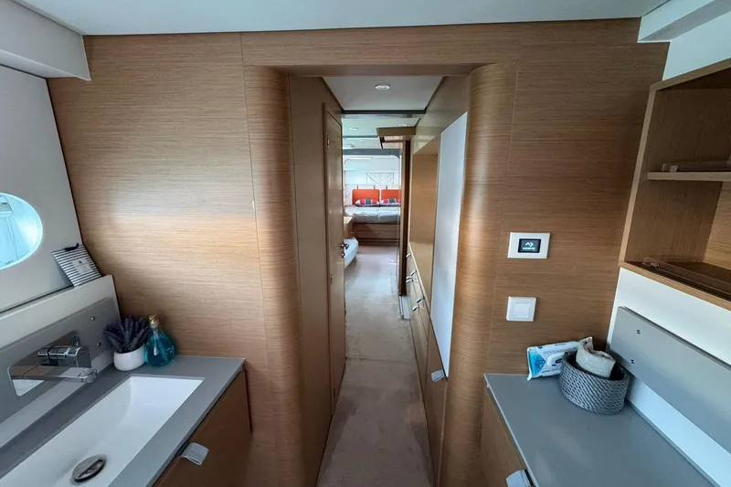  Yacht Photos Pics Interior of 2021 Excess 15 yacht, featuring modern wood paneling and sleek design.