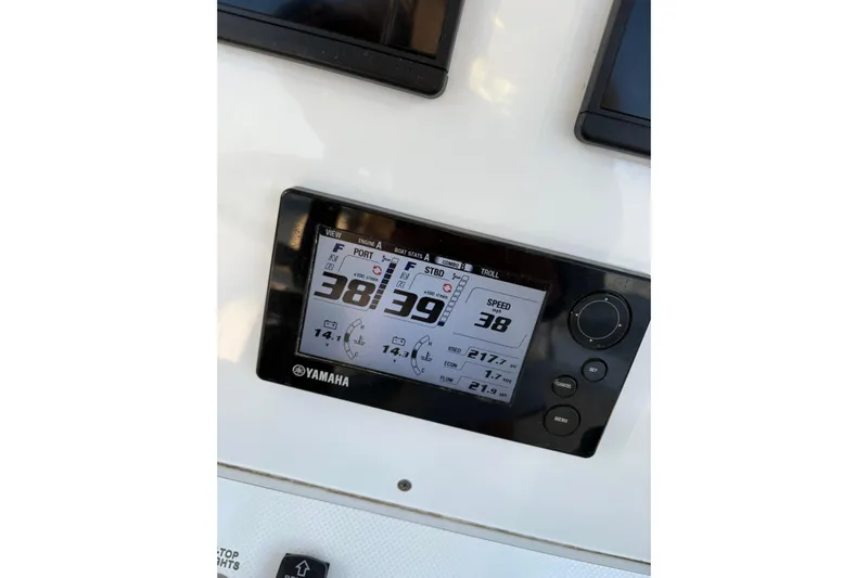 Elizabeth II Yacht Photos Pics Yamaha display on 2001 Contender 31 Open boat dashboard showing speed and engine data.