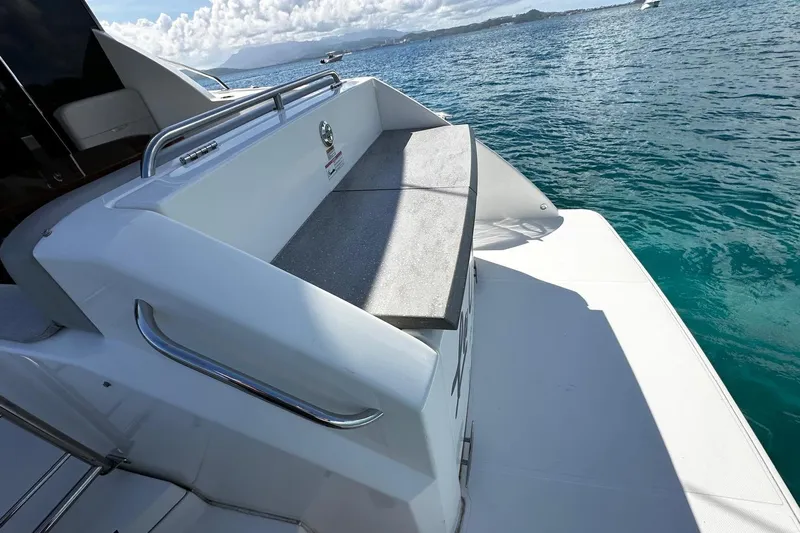  Yacht Photos Pics 2022 Tiara Yachts C39 Coupe deck with ocean view and seating area.