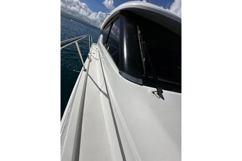  Yacht Photos Pics 2022 Tiara Yachts C39 Coupe side deck with ocean view.