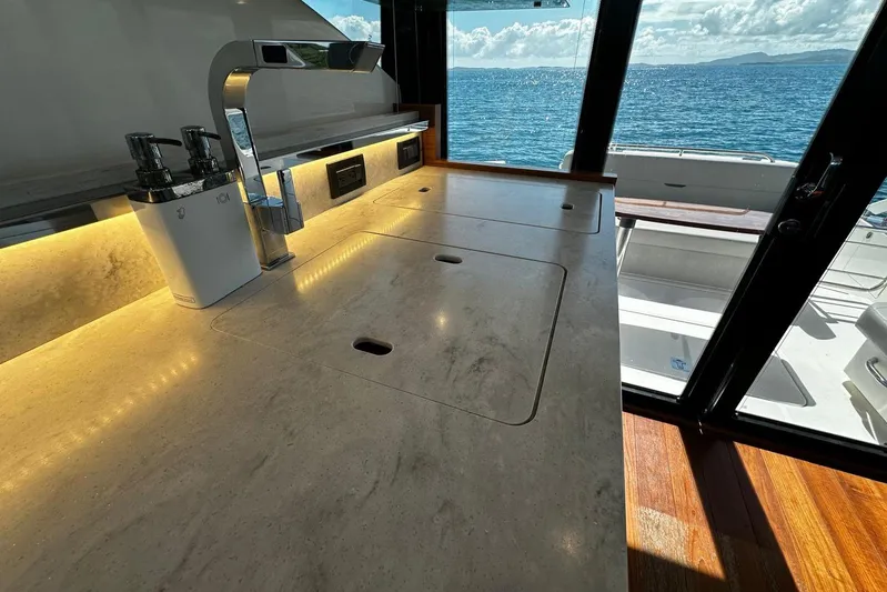  Yacht Photos Pics Luxurious kitchen area on 2022 Tiara Yachts C39 Coupe with ocean view.