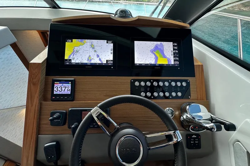  Yacht Photos Pics Helm of 2022 Tiara Yachts C39 Coupe with navigation screens and controls.
