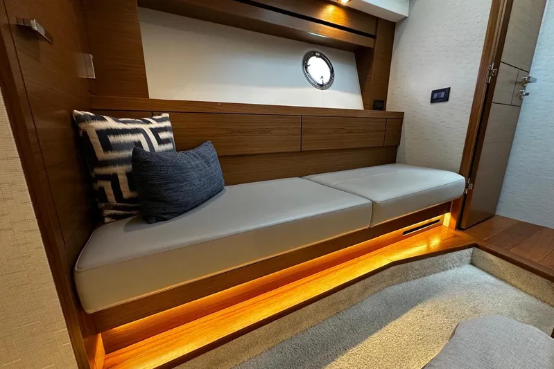  Yacht Photos Pics 2022 Tiara Yachts C39 Coupe interior with modern seating and ambient lighting.